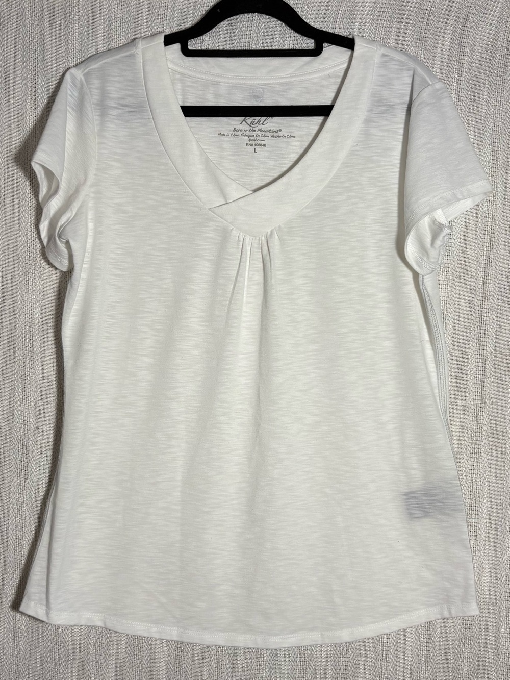 Kuhl Women's White V-Neck Short Sleeve Tee with Front Pleat